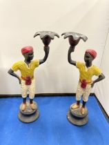 A PAIR OF 19TH CENTURY AUSTRIAN COLD PAINTED BRONZE BLACK A MOOR BOYS CANDLESTICKS