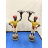 A PAIR OF 19TH CENTURY AUSTRIAN COLD PAINTED BRONZE BLACK A MOOR BOYS CANDLESTICKS