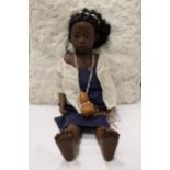 A GOTZ PSH 'PHILLIP HEATH' AFRICAN GIRL DOLL IN TRADITIONAL DRESS