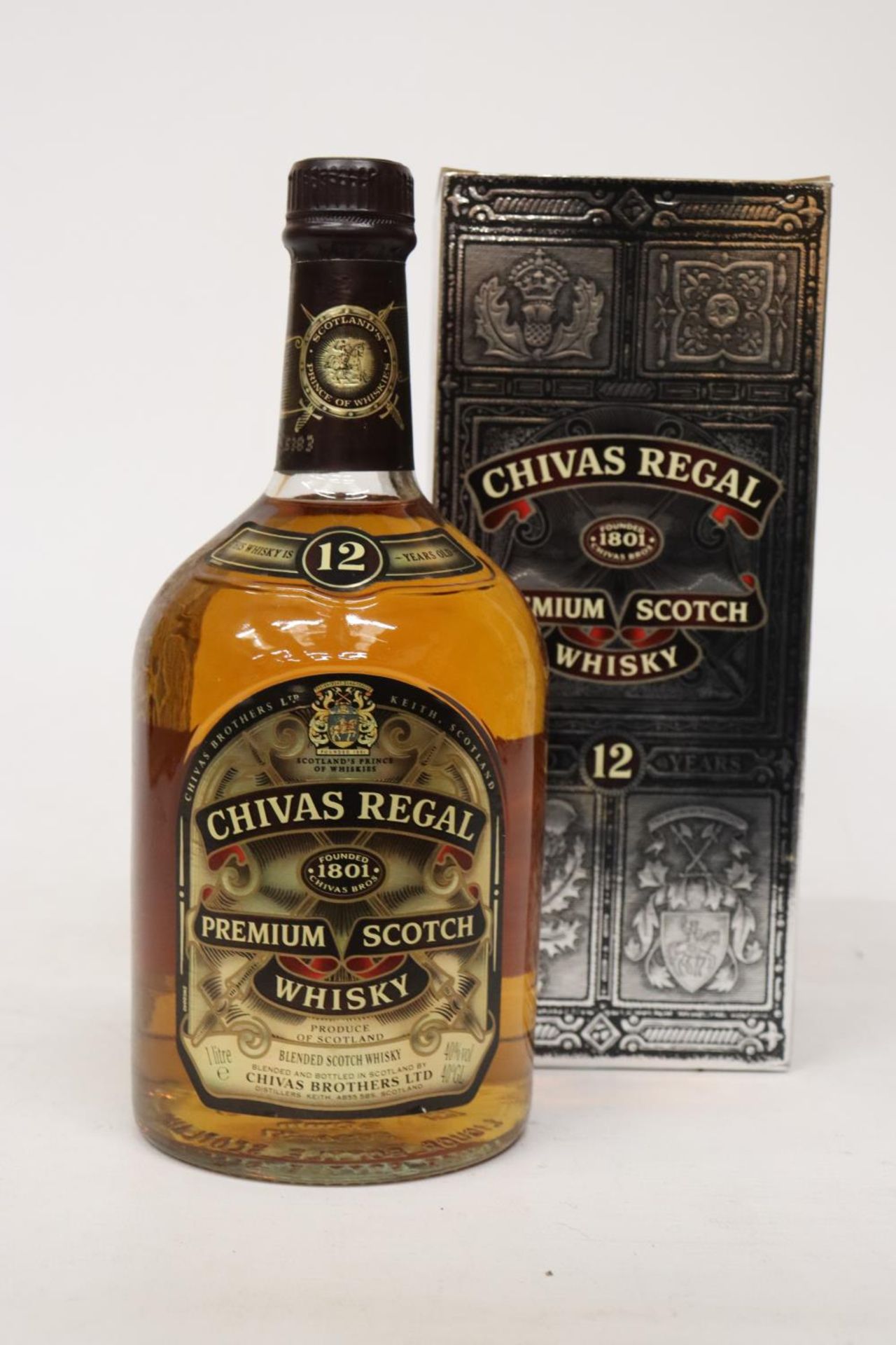 A BOTTLE OF CHIVAS REGAL 12 YEAR OLD WHISKY, BOXED