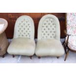 A PAIR OF HOOPED BUTTON BACK LOW UPHOLSTERED CHAIRS WITH FRONT CABRIOLE LEGS