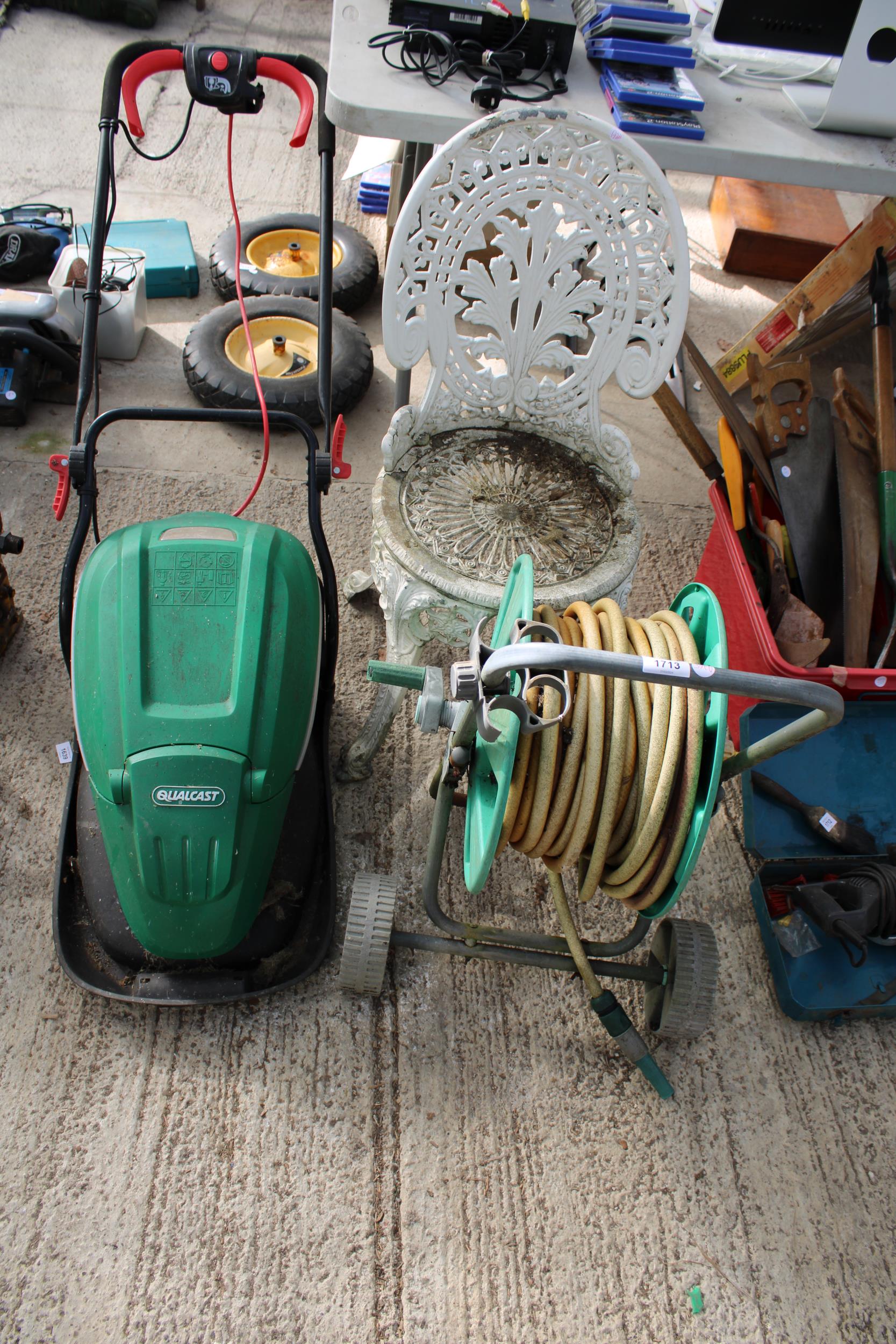 A CAST ALLOY BISTRO CHAIR, A QUALCAST ELECTRIC LAWN MOWER AND A HOSE REEL WITH HOSE