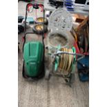 A CAST ALLOY BISTRO CHAIR, A QUALCAST ELECTRIC LAWN MOWER AND A HOSE REEL WITH HOSE