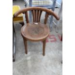 A CHILDS BENTWOOD ELBOW CHAIR