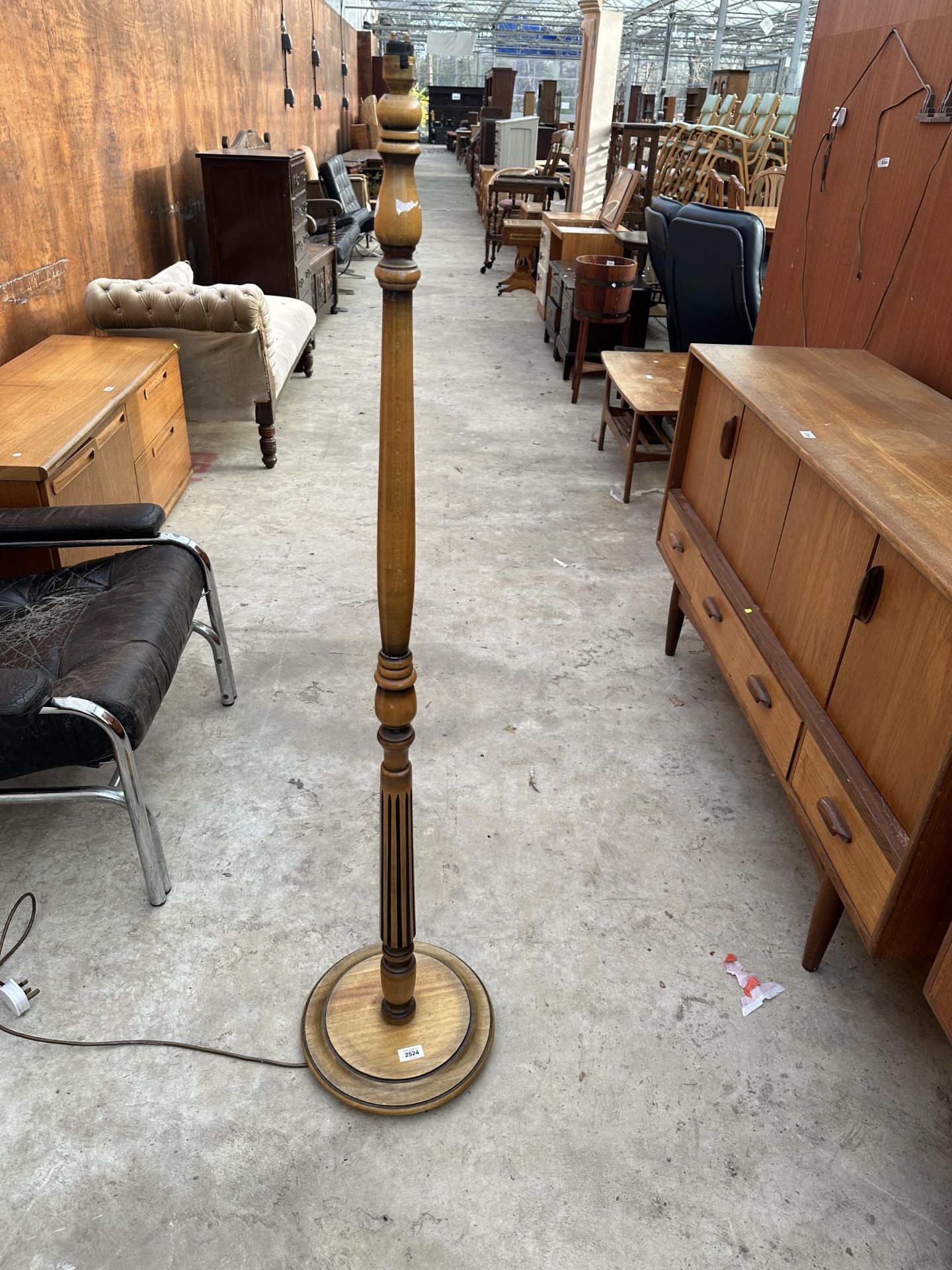 A MID 20TH CENTURY STANDARD LAMP ON TURNED AND FLUTED COLUMN