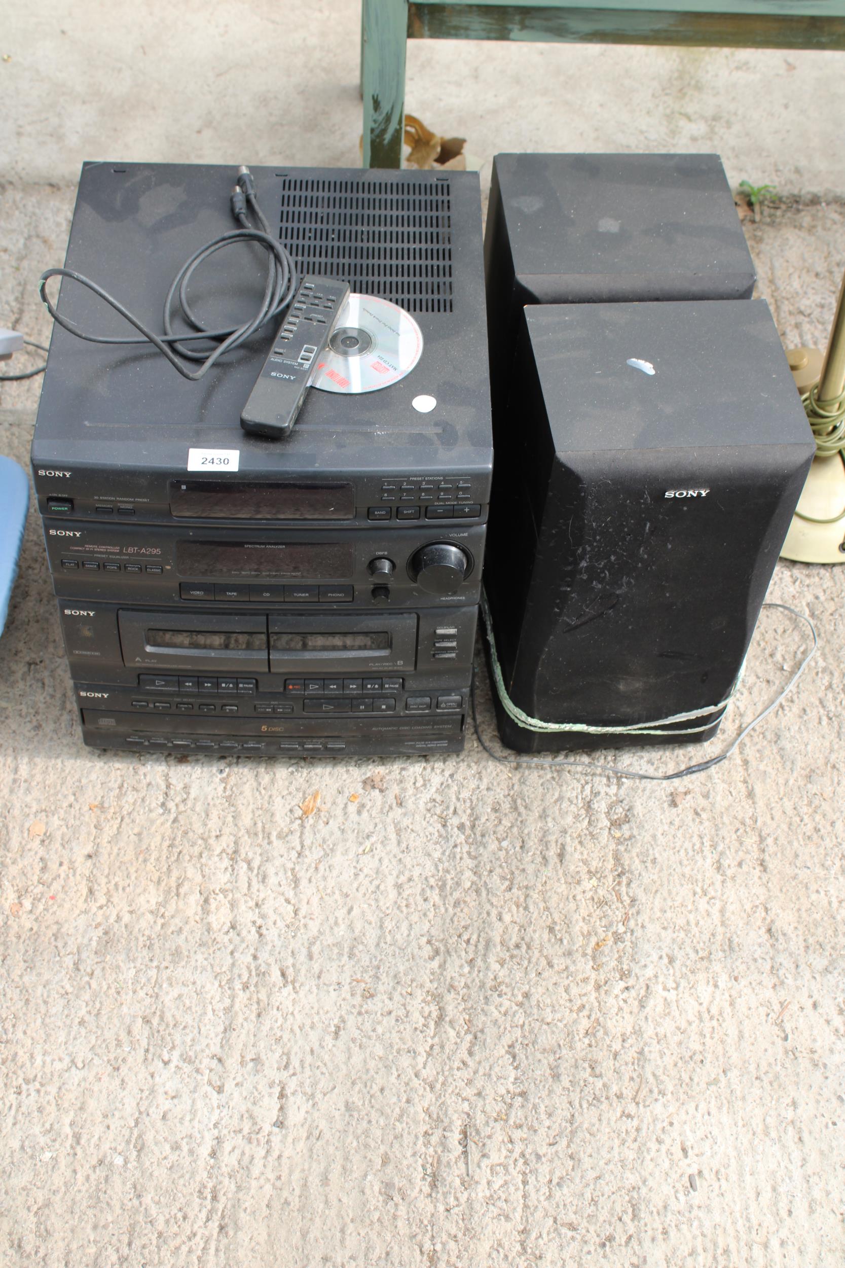 A SONY STEREO SYSTEM WITH A PAIR OF SPEAKERS