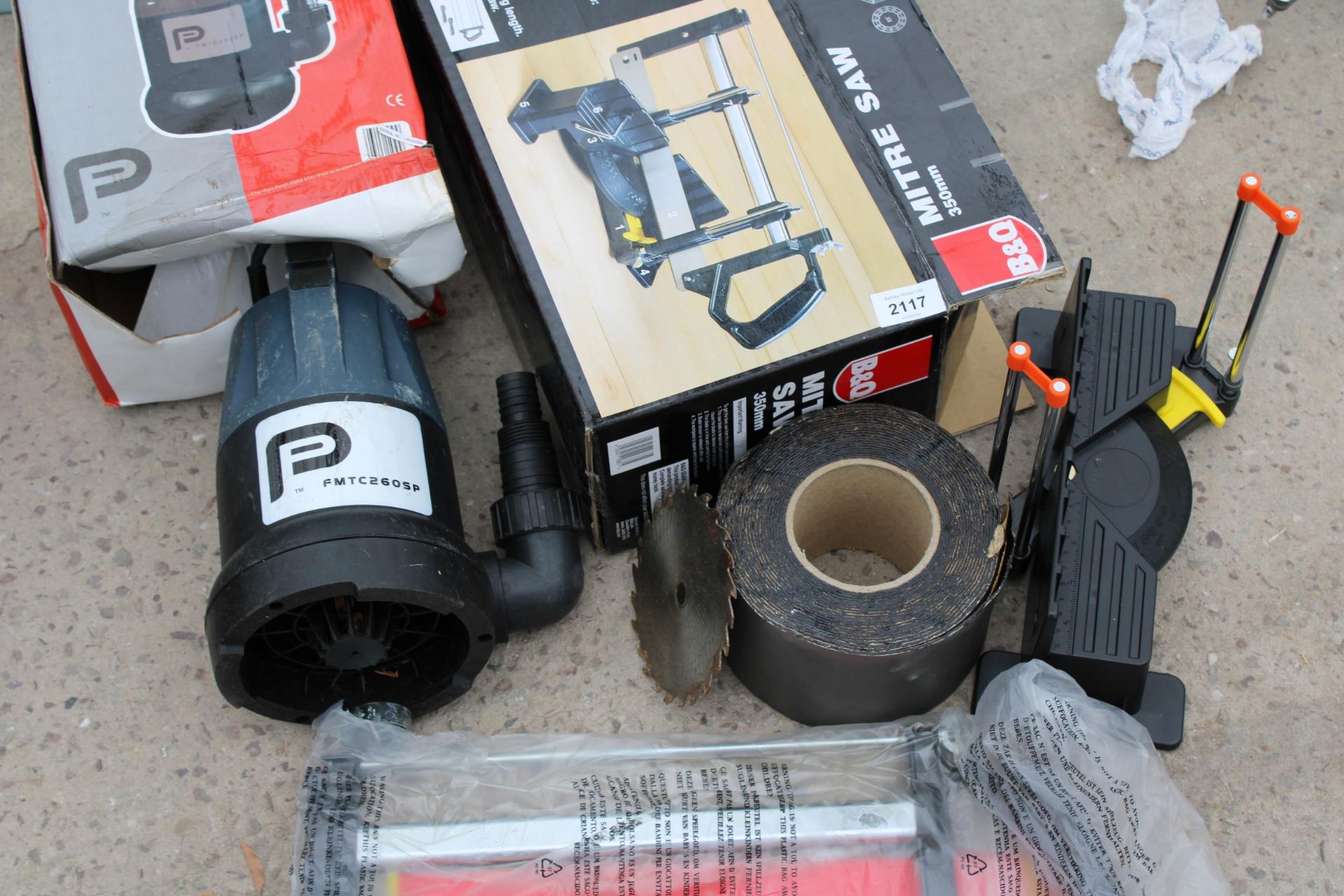 AN ASSORTMENT OF TOOLS TO INCLUDE A WATER PUMP, A SMALL MITRE SAW AND AN EXTENSION LEAD ETC - Image 2 of 3