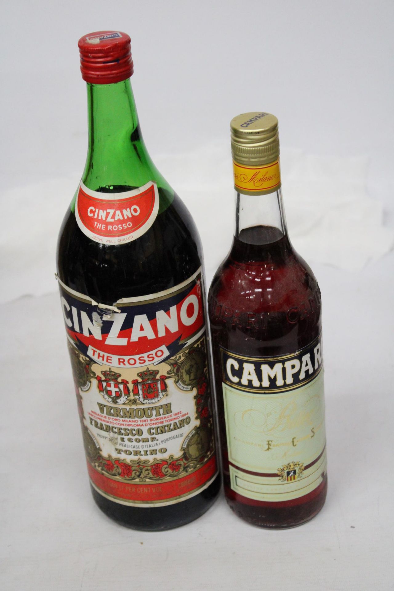 A 1.5 LITRE BOTTLE OF CINZANO ROSSO VERMOUTH TOGETHER WITH A BOTTLE OF CAMPARI