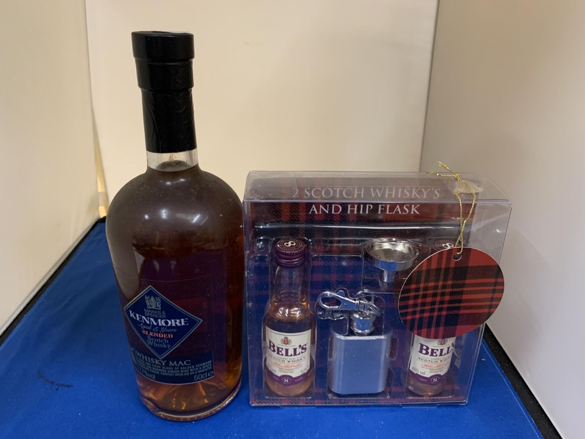 A 50CL BOTTLE OF KENMORE WHISKY MAC AND A SET CONTAINING TWO WHISKY MINATURES AND HIP FLASK