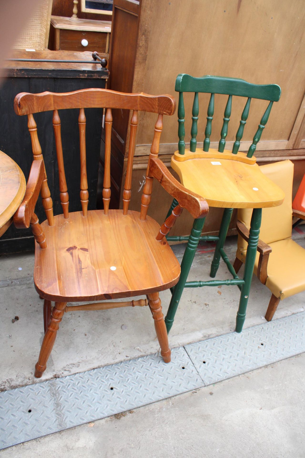 A PINE ELBOW CHAIR AND A HIGH BACK STOOL