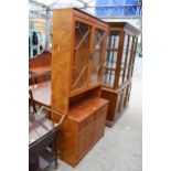 A BERESFORD AND HICKS LTD YEW WOOS TWO DOOR BOOKCASE ON BASE 36" WIDE