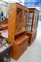 A BERESFORD AND HICKS LTD YEW WOOS TWO DOOR BOOKCASE ON BASE 36" WIDE
