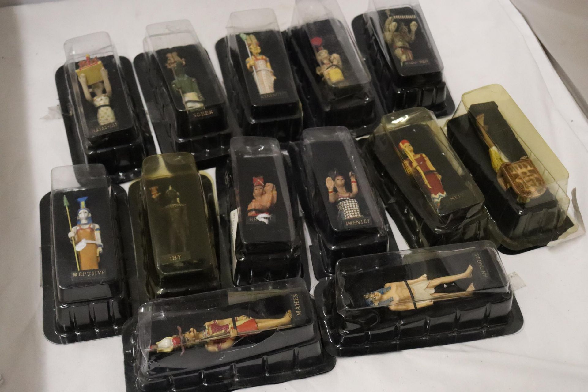 A COLLECTION OF HANDPAINTED EGYPTIAN FIGURES - 13 IN TOTAL