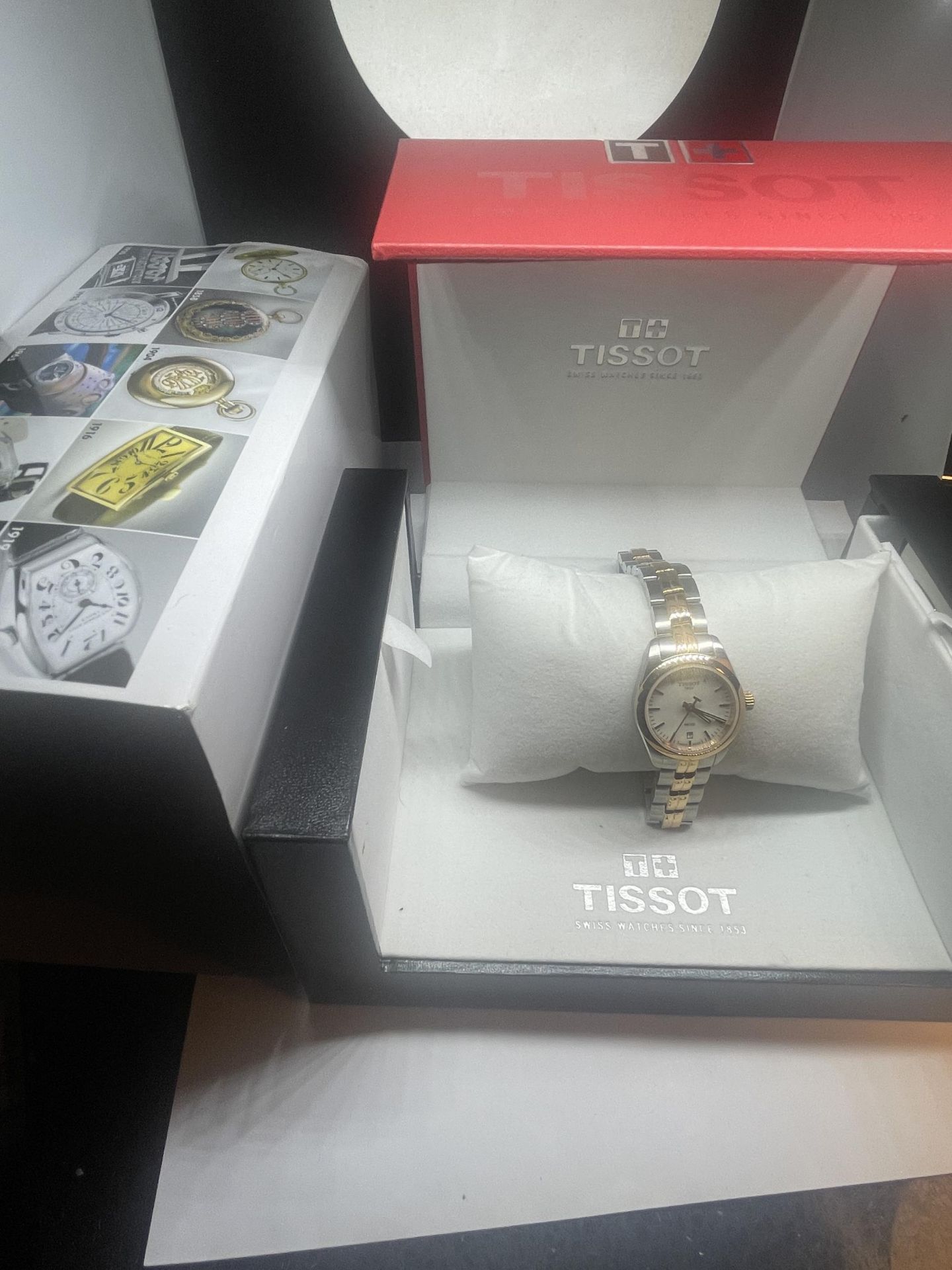 A BOXED TISSOT PR100 WRIST WATCH WITH CHROME AND YELLOW METAL STRAP WITH PEARLISED FACE