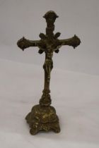 A LARGE HEAVY BRASS CROSS