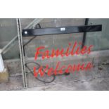 AN ILLUMINATED 'FAMILIES WELCOME' SIGN BELIEVED IN WORKING ORDER BUT NO WARRANTY, FROM FRANKIE AND