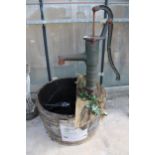 A VINTAGE WOODEN BARREL WATER FEATURE WITH VINTAGE CAST IRON WATER PUMP AND ELECTRIC PUMP