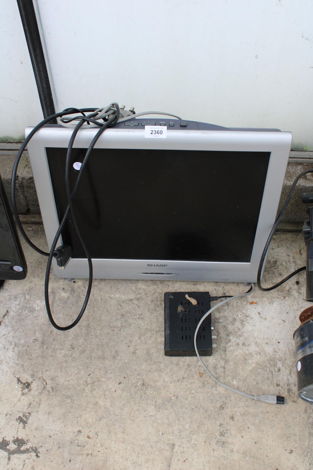 A SHARP 20" LCD TV