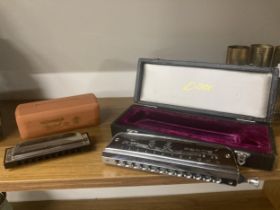 TWO HARMONICAS TO INCLUDE A HOHNER SPECIAL 20 AND A LARK CHROMATIC HARMONICA