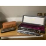 TWO HARMONICAS TO INCLUDE A HOHNER SPECIAL 20 AND A LARK CHROMATIC HARMONICA