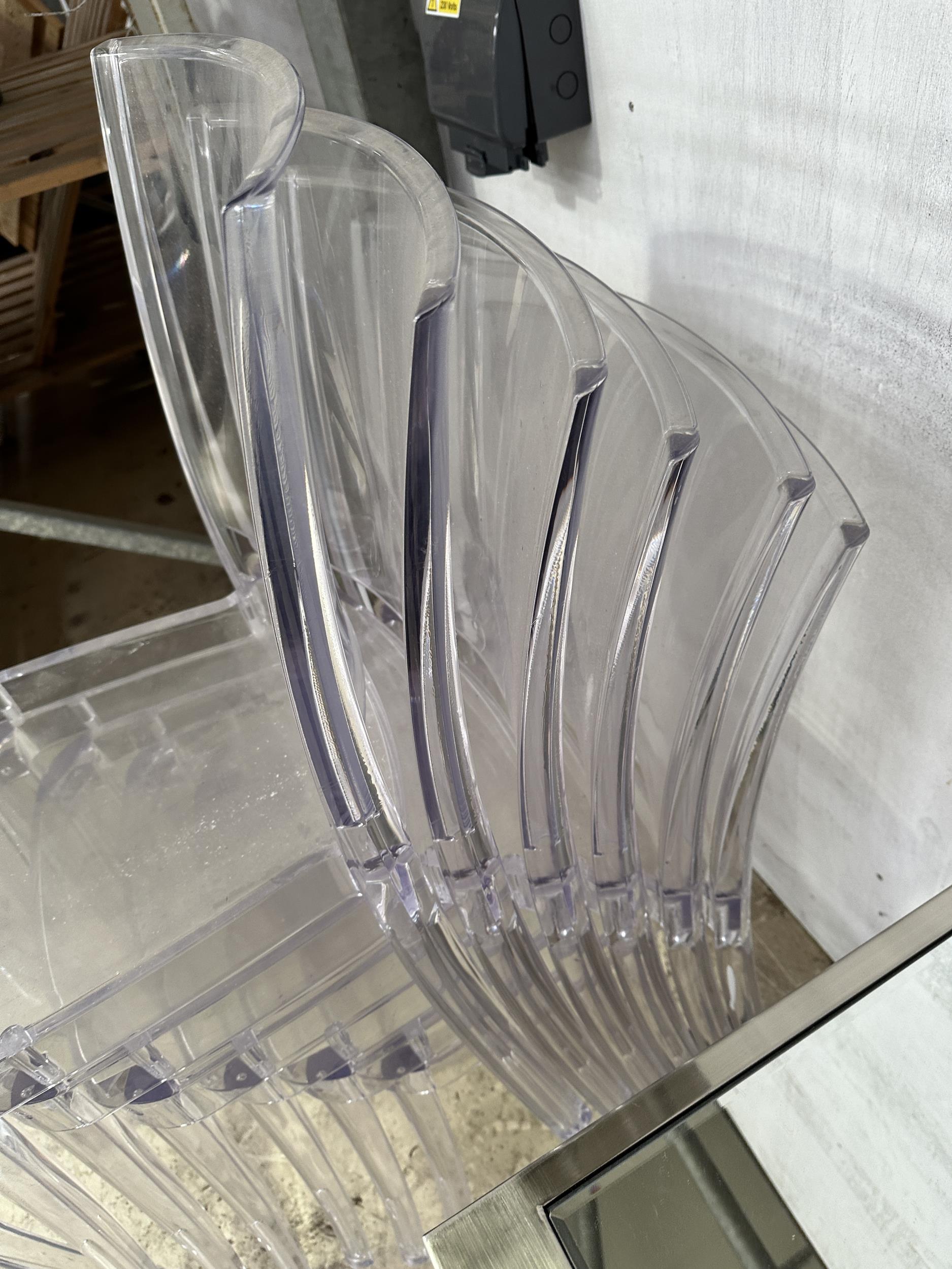 SEVEN MODERN CLEAR PLASTIC STACKING CHAIRS (FROM A DEVELOPER'S SHOW HOME - BELIEVED UNUSED) - Image 4 of 4