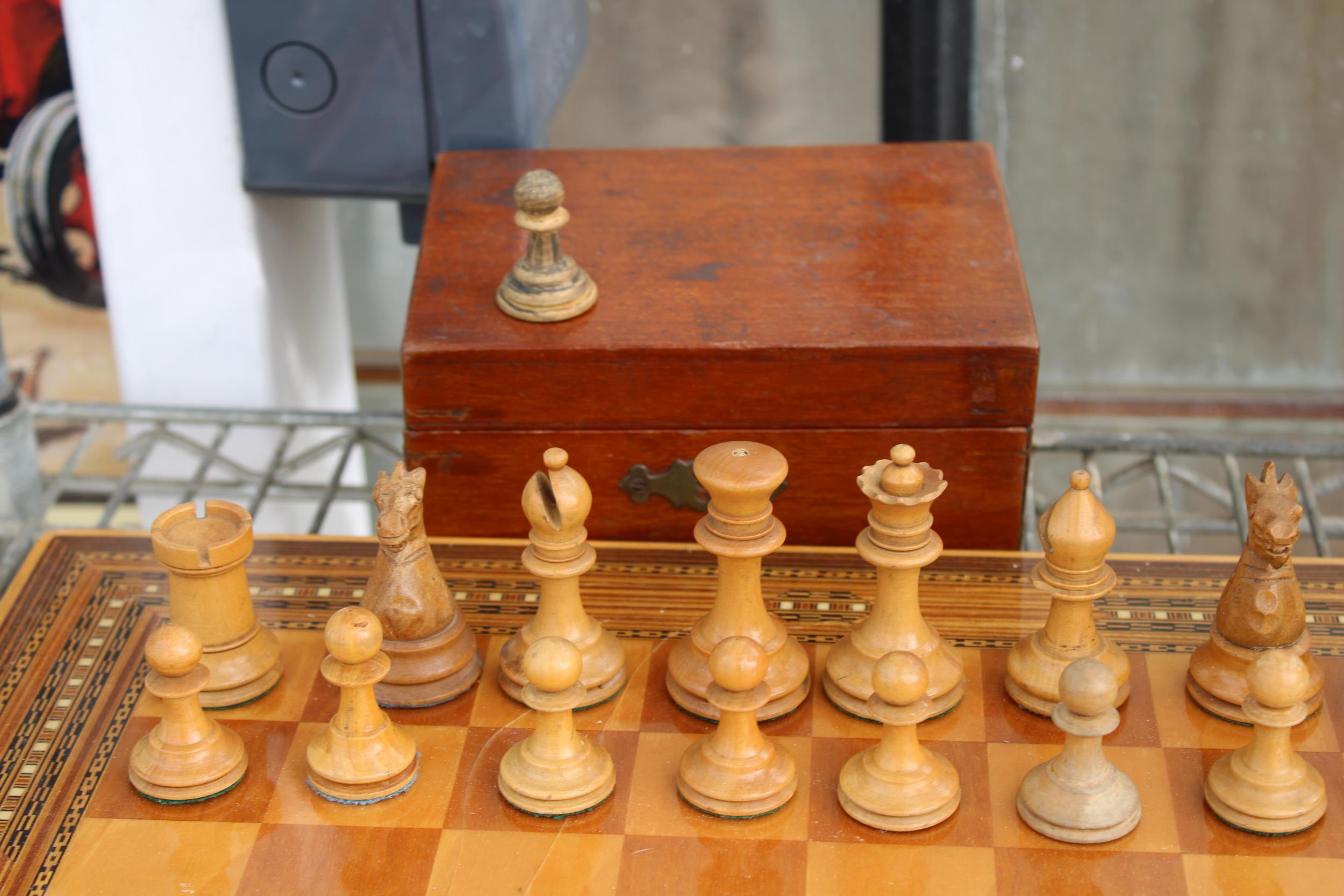 A VINTAGE CHESS BOARD WITH A CHESS SET (ONE PIECE IS A REPLACEMENT) - Image 2 of 3