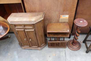 A MODERN JARDINER STAND ON BARLEY TWIST COLUMN, MAGAZINE RACK AND A SMALL OAK TWO DOOR CUPBOARD