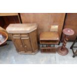 A MODERN JARDINER STAND ON BARLEY TWIST COLUMN, MAGAZINE RACK AND A SMALL OAK TWO DOOR CUPBOARD