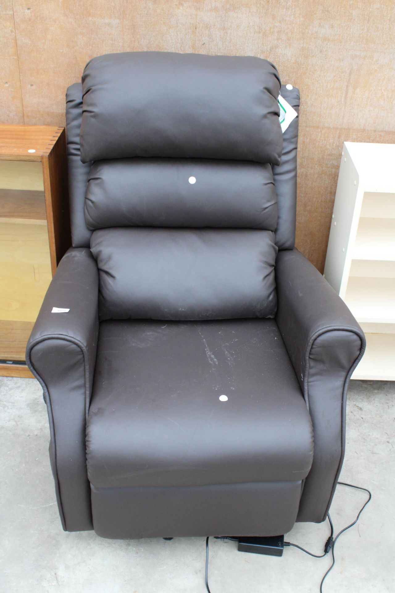 A FAUX LEATHER ELECTRIC RECLINER