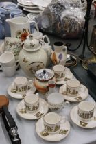 A QUANTITY OF CERAMICS TO INCLUDE CLASSICAL THEMED CUPS AND SAUCERS, PLATES, A LIDDED JAR,