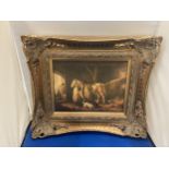 A GILT FRAMED PRINT OF A FAMILY AND DOGS IN A STABLE WITH A HORSE 17CM X 22CM