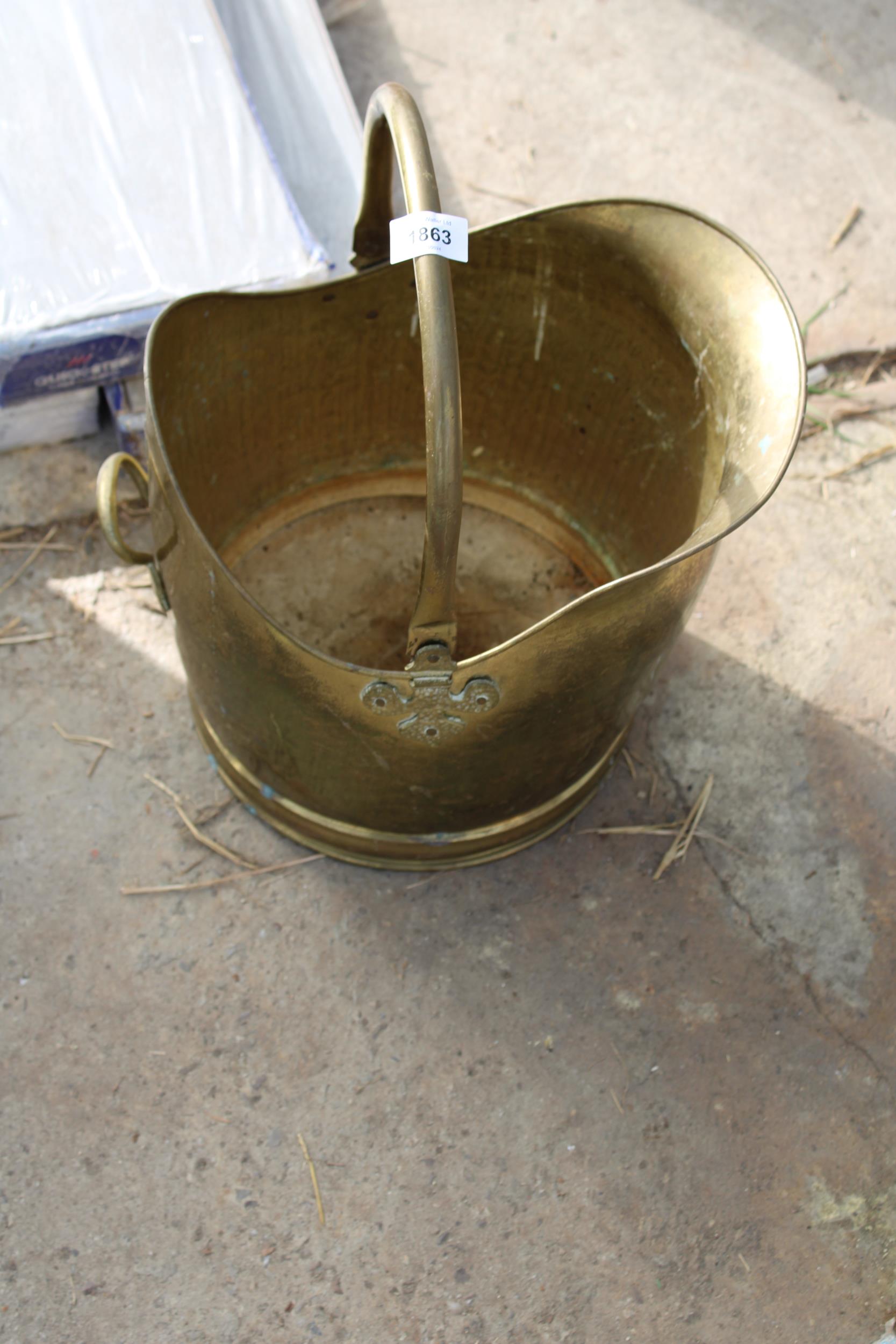 A VINTAGE BRASS COAL BUCKET