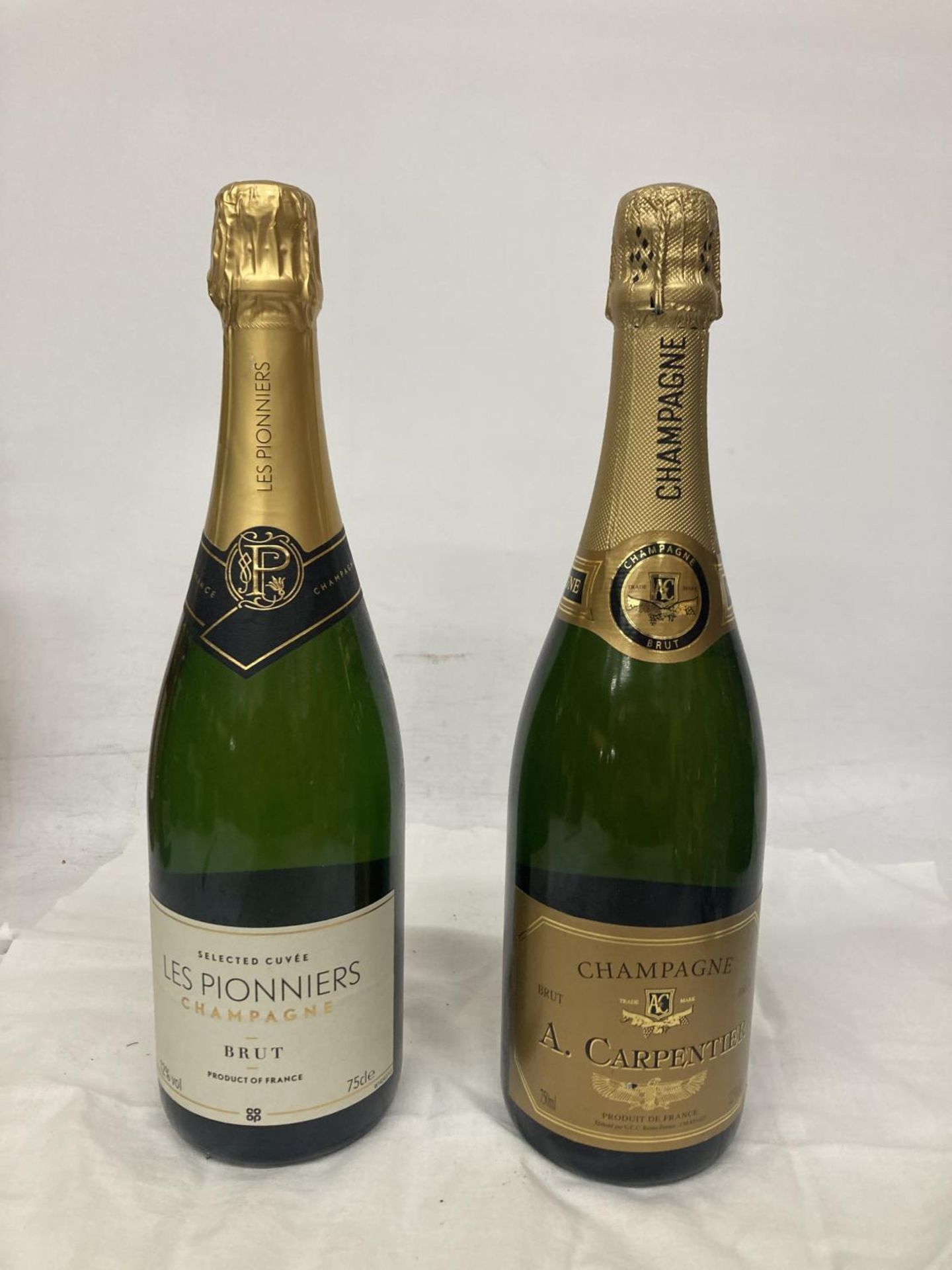 TWO 75CL BOTTLES OF CHAMPAGNE TO INCLUDE A. CARPENTIER AND LES PIONNIERS