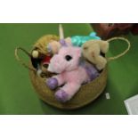 A BASKET CONTAINING A QUANTITY OF SOFT TOYS SOME WITH TAGS