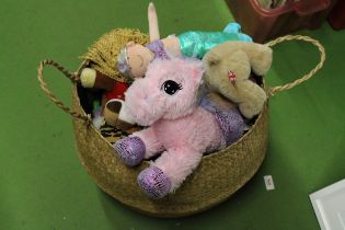 A BASKET CONTAINING A QUANTITY OF SOFT TOYS SOME WITH TAGS