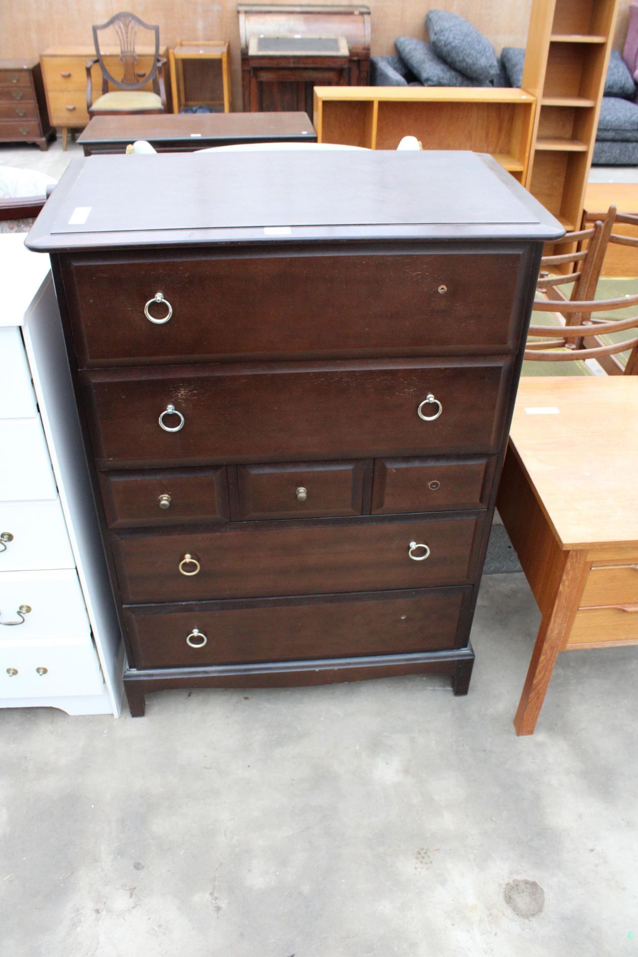 A STAG MINSTREL CHEST OF THREE SHORT AND FOUR LONG DRAWERS 32" WIDE