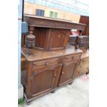 A MID 20TH CENTURY OAK COURT CUPBOARD