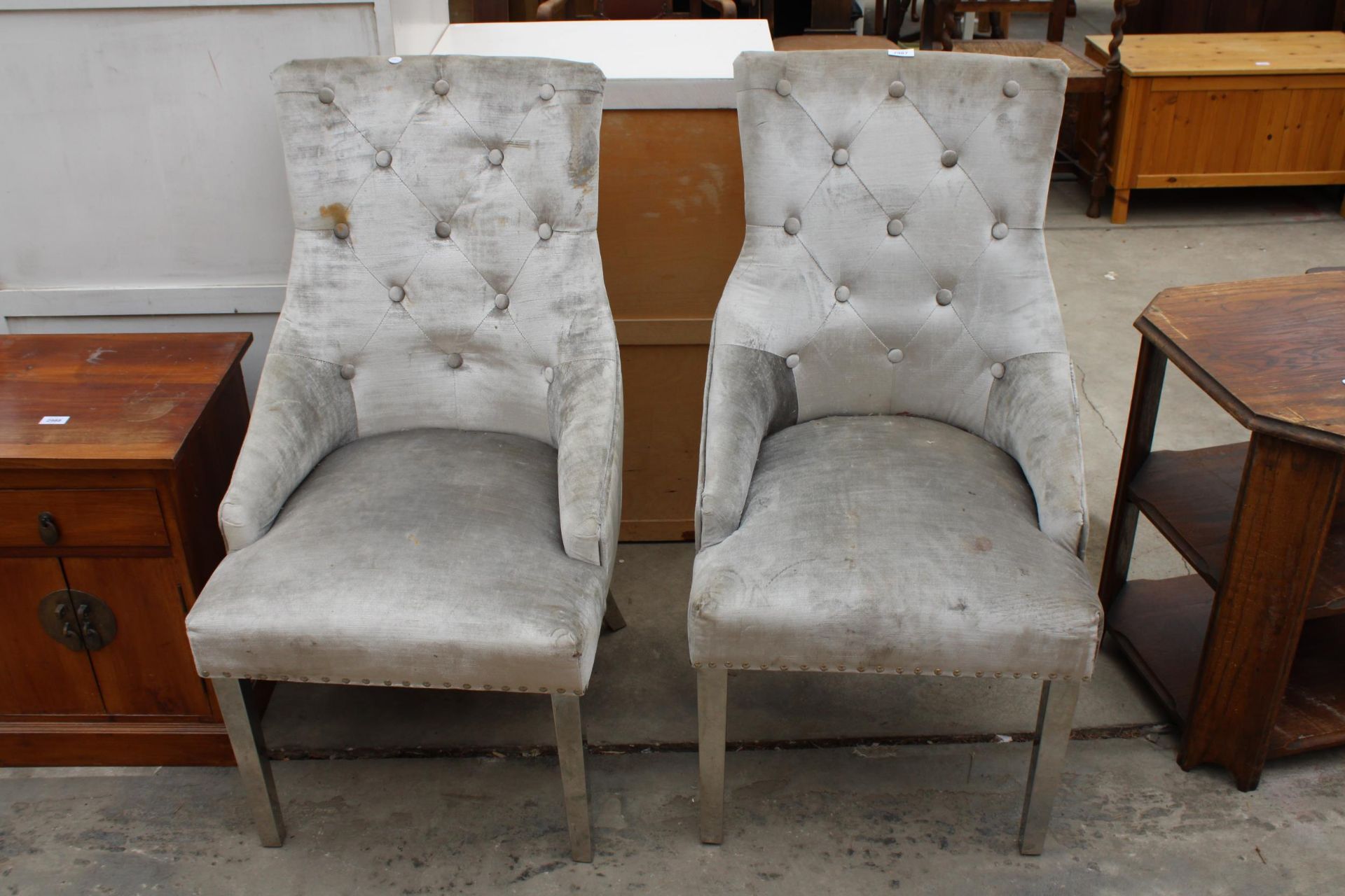 A PAIR OF MODERN HIGH BACK DINING CHAIRS ON CHROME LEGS