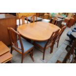 A NATHAN RETRO TEAK EXTENDING DINING TABLE 64" X 41" (LEAF 18") ON WHALE FIN LEGS AND SIX DINING
