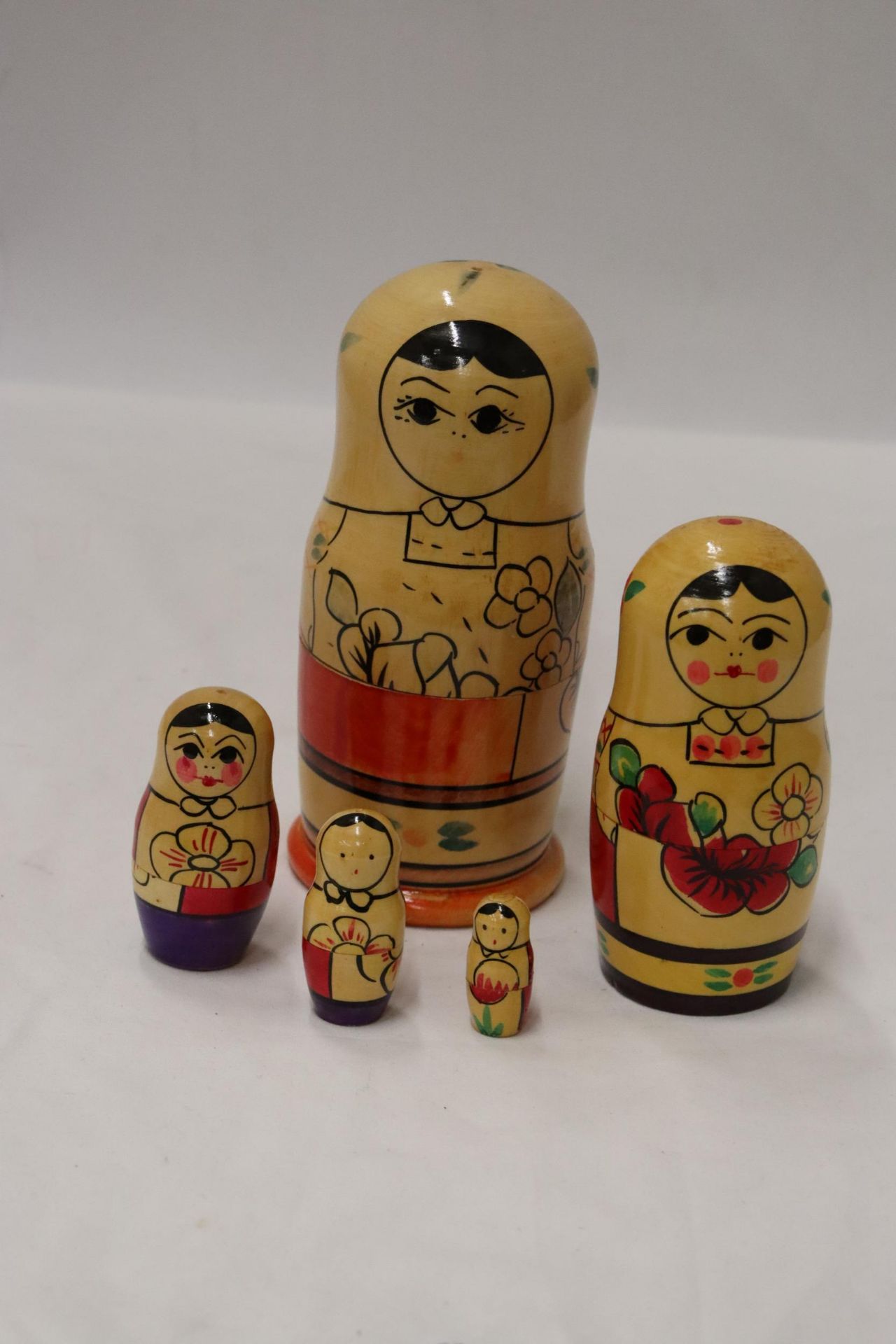 A LARGE RUSSIAN NESTING DOLL