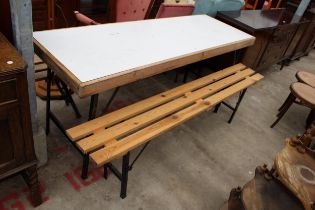 A FOLDING TABLE AND PAIR OF FOLDING BENCHES