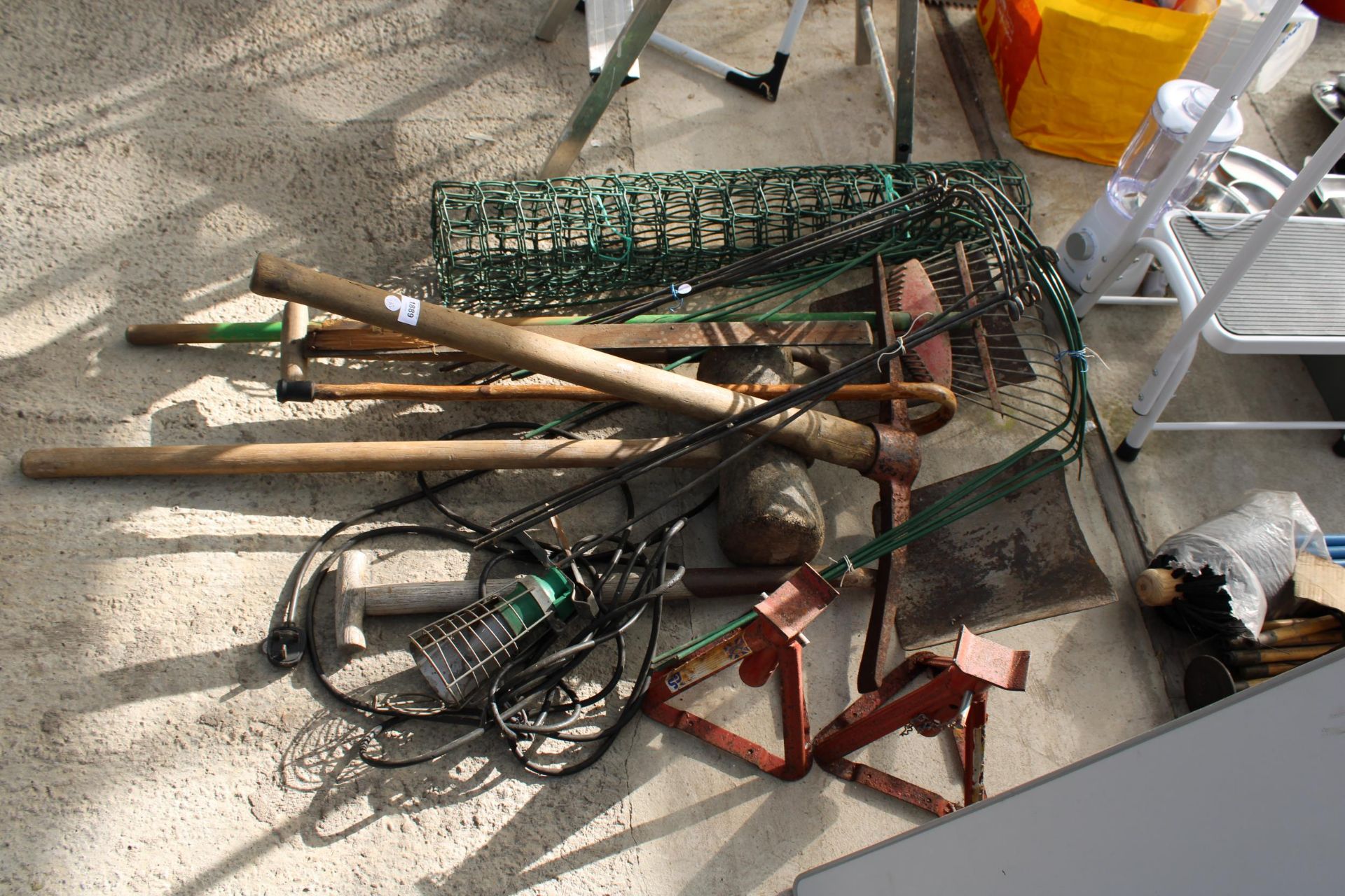AN ASSORTMENT OF GARDEN TOOLS TO INCLUDE TWO SHOVELS, A LARGE RUBBER MALLET AND A PICK AXE ETC - Image 2 of 2