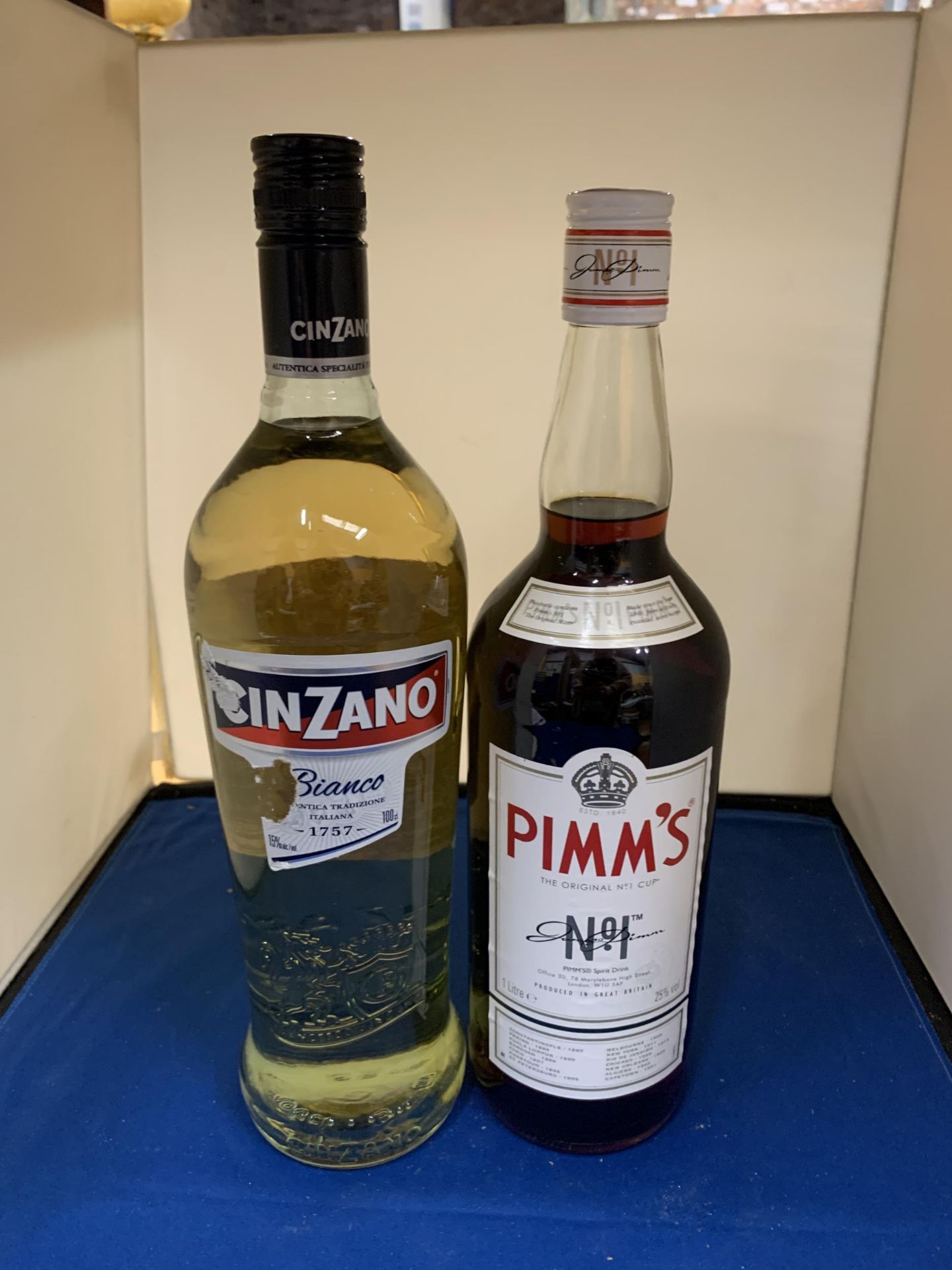 TWO BOTTLES TO INCLUDE A LITRE BOTTLE OF CINZANO AND A PIMMS NO.1