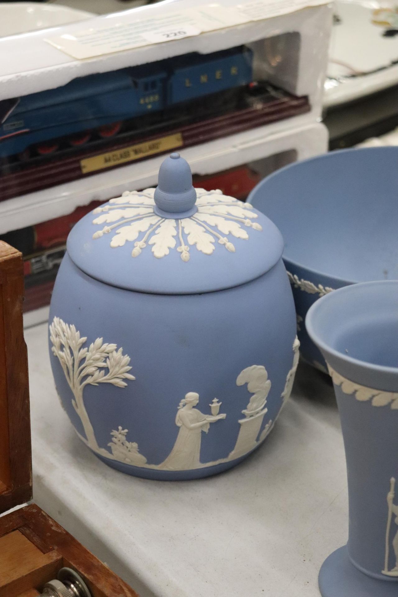 A COLLECTION OF JASPERWARE BLUE AND WHITE WEDGWOOD TO INCLUDE A BISCUIT BARREL, VASES, TINKET BOXES, - Image 3 of 11