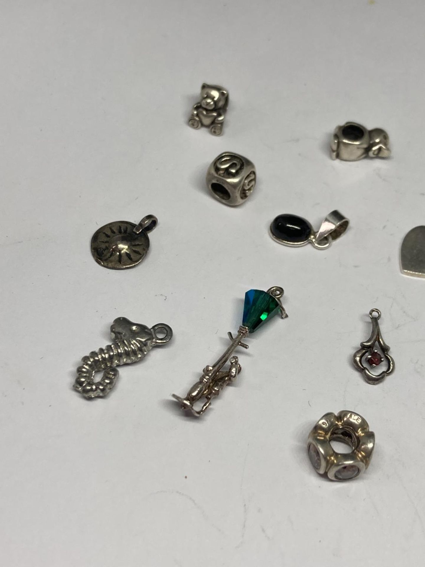 FIFTEEN SILVER CHARMS - Image 2 of 3