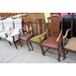 AN EARLY 20TH CENTURY OAK CARVER CHAIR, A CHIPPENDALE STYLE CARVER AND A QUEEN ANNE STYLE DINING