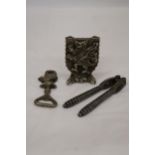 A GRYPHON DOOR STOP TOGETHER WITH A KNIGHT BOTTLE OPENER AND VICTORIAN NUT CRACKER