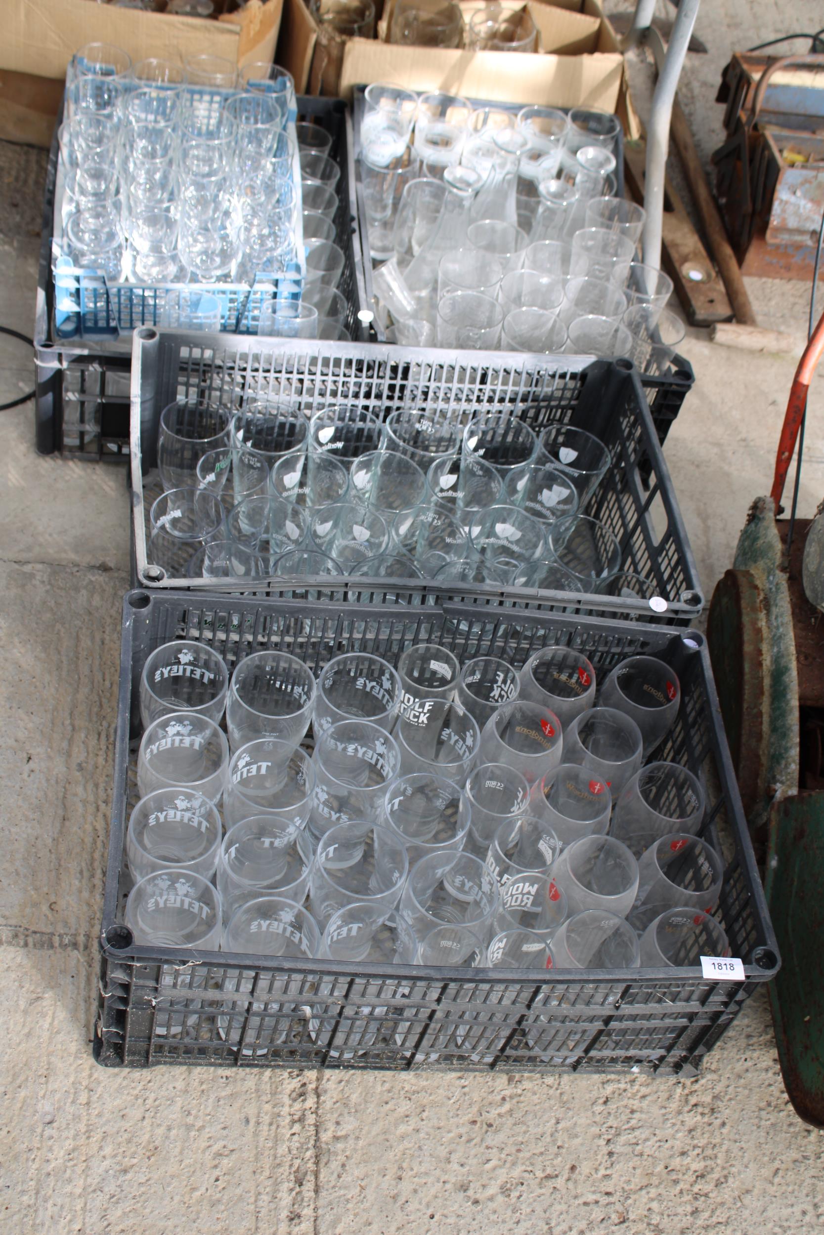 A LARGE ASSORTMENT OF BRANDED AND UNBRANDED PUB GLASSES