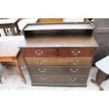AN EARLY 20TH CENTURY OAK CHEST OF TWO SHORT AND THREE LONG GRADUATED DRAWERS WITH GALLERY SHELF