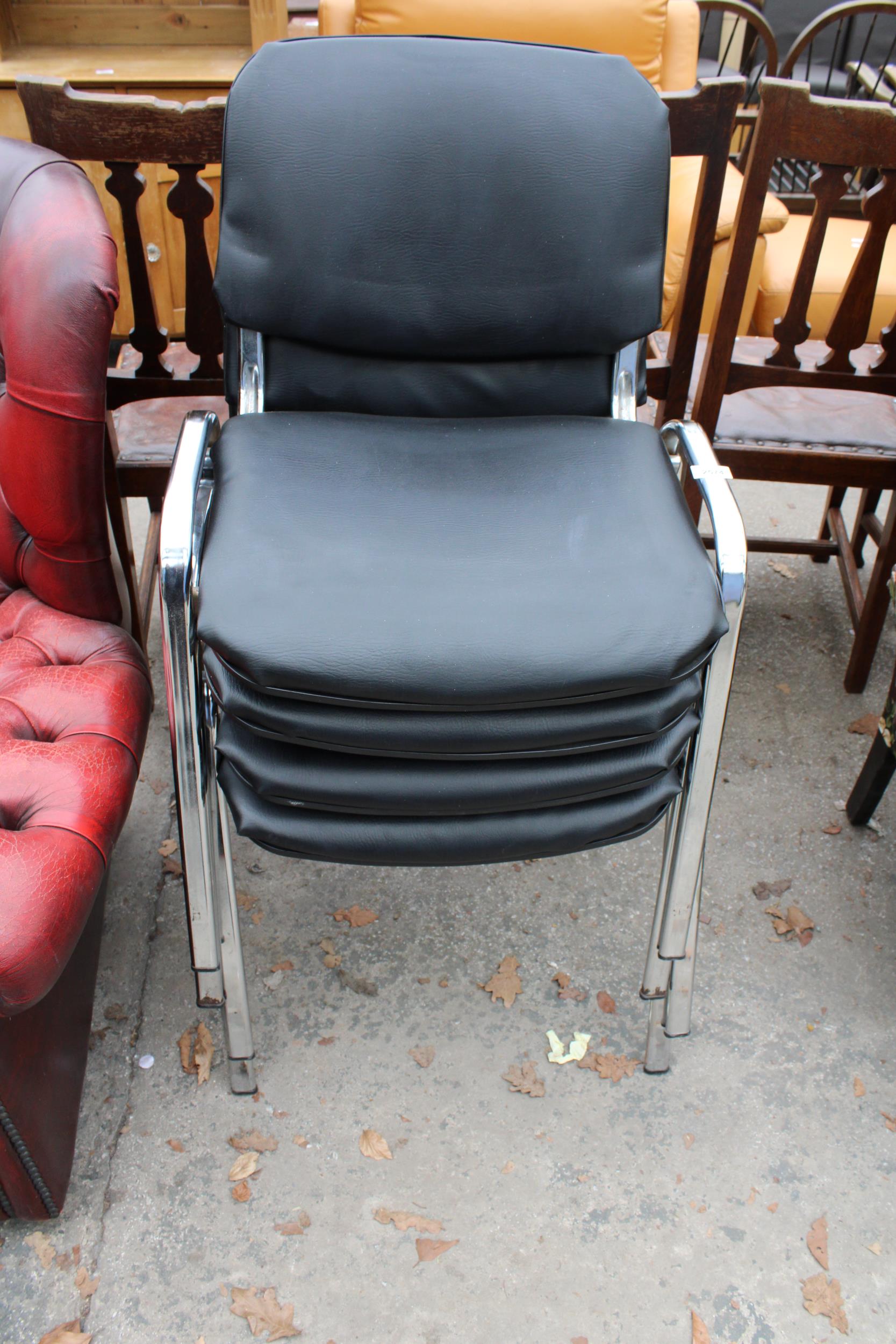 A SET OF FOUR BLACK FAUX LEATHER STACKING CHAIRS ON POLISHED CHROME FRAME - Image 2 of 2